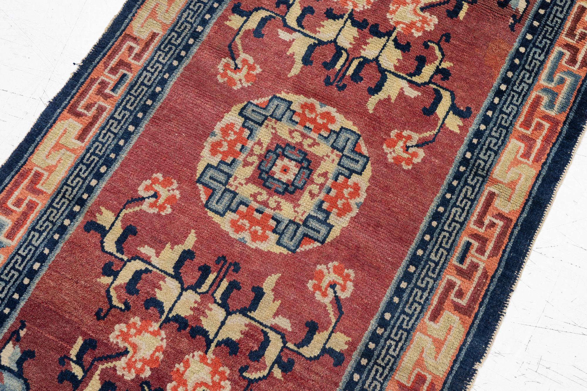 Carpet, antique China, approx. 128 x 67 cm.
