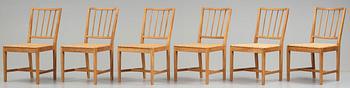 JOSEF FRANK, a set of six elm and rattan dining chairs, model 800.