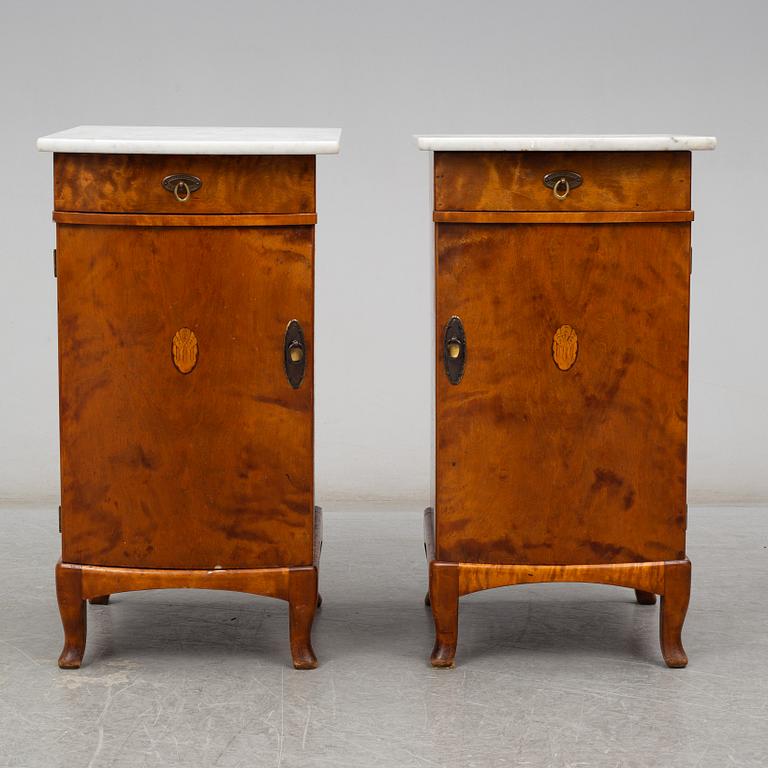 A pair of bedside tables, early 20th century.