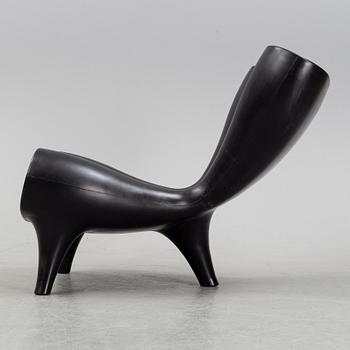 A Marc Newson, a 'Orgone' chair, designed 1993.