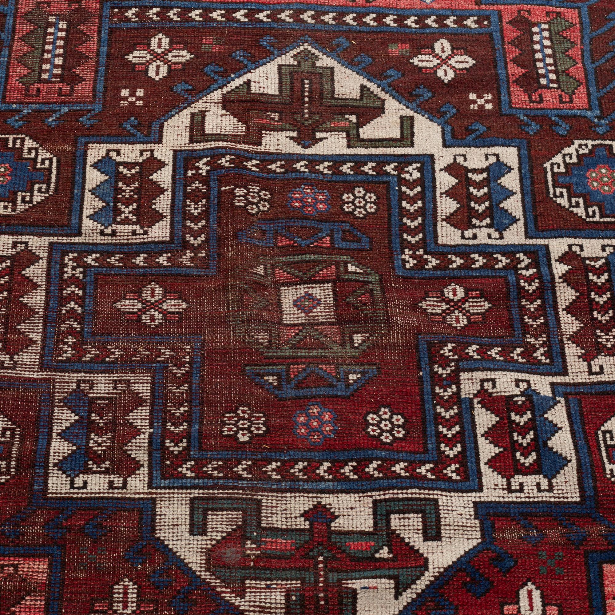 AN ANTIQUE TURKISH RUG, probably Bergama, ca 256 x 183 cm.