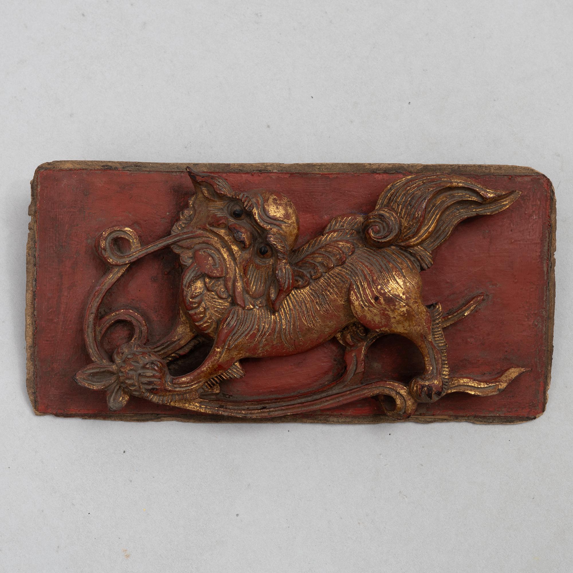 A group of three Chinese wooden panels, late Qing dynasty / around 1900.