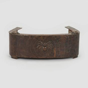 An early 20th century Jugend fire basket.