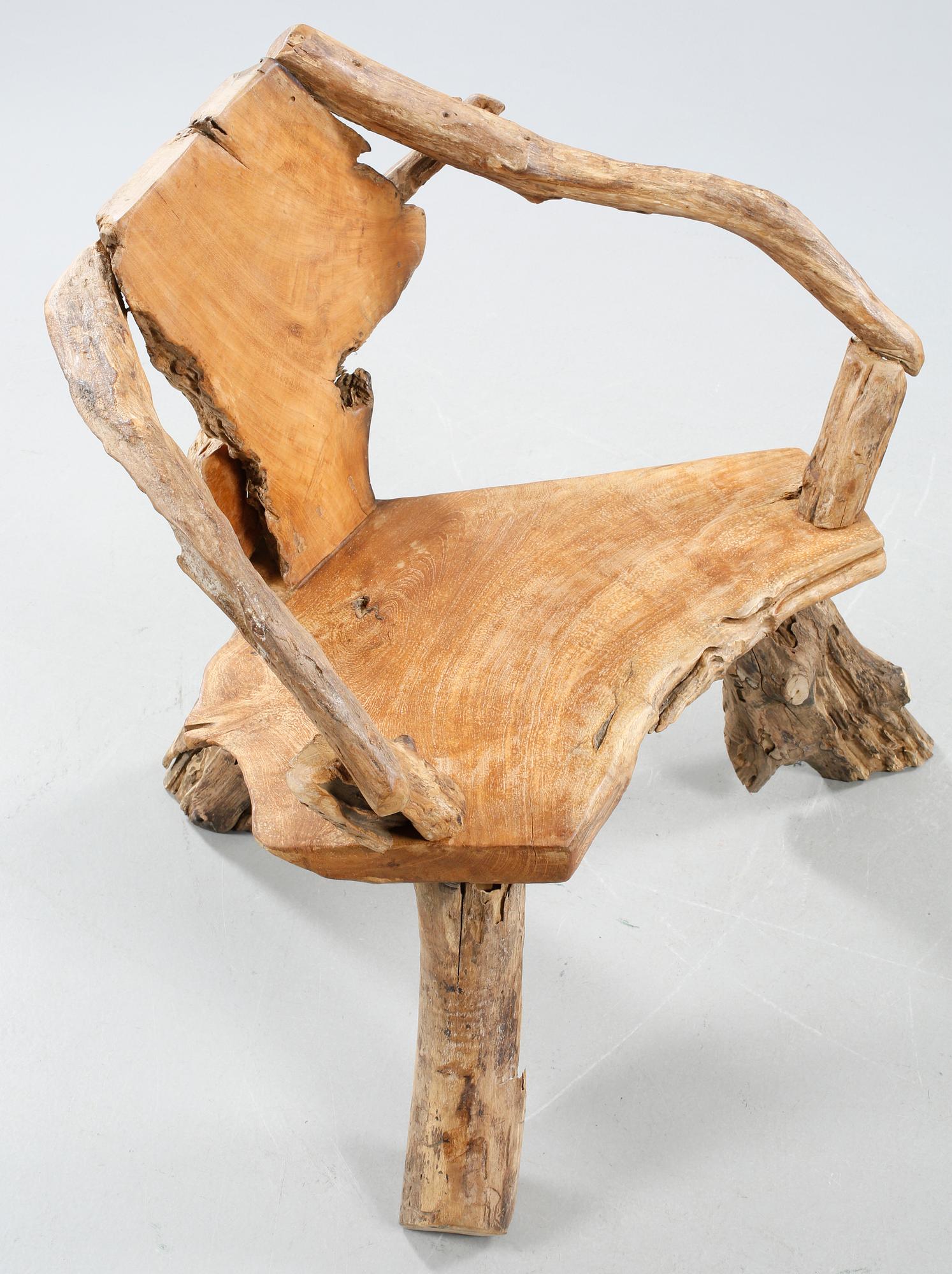 A wooden armchair, modern made.