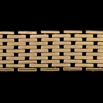 ARMBAND, 18 k guld, 1962. Vikt ca 33 g.