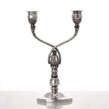 Johan Rohde, a sterling silver two branched candelabrum, Georg Jensen, Copenhagen 1945-77, design nr 343.