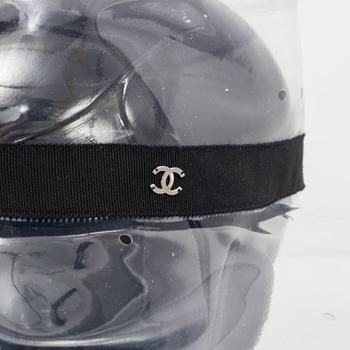 Chanel, a transparent PVC hat, size S.