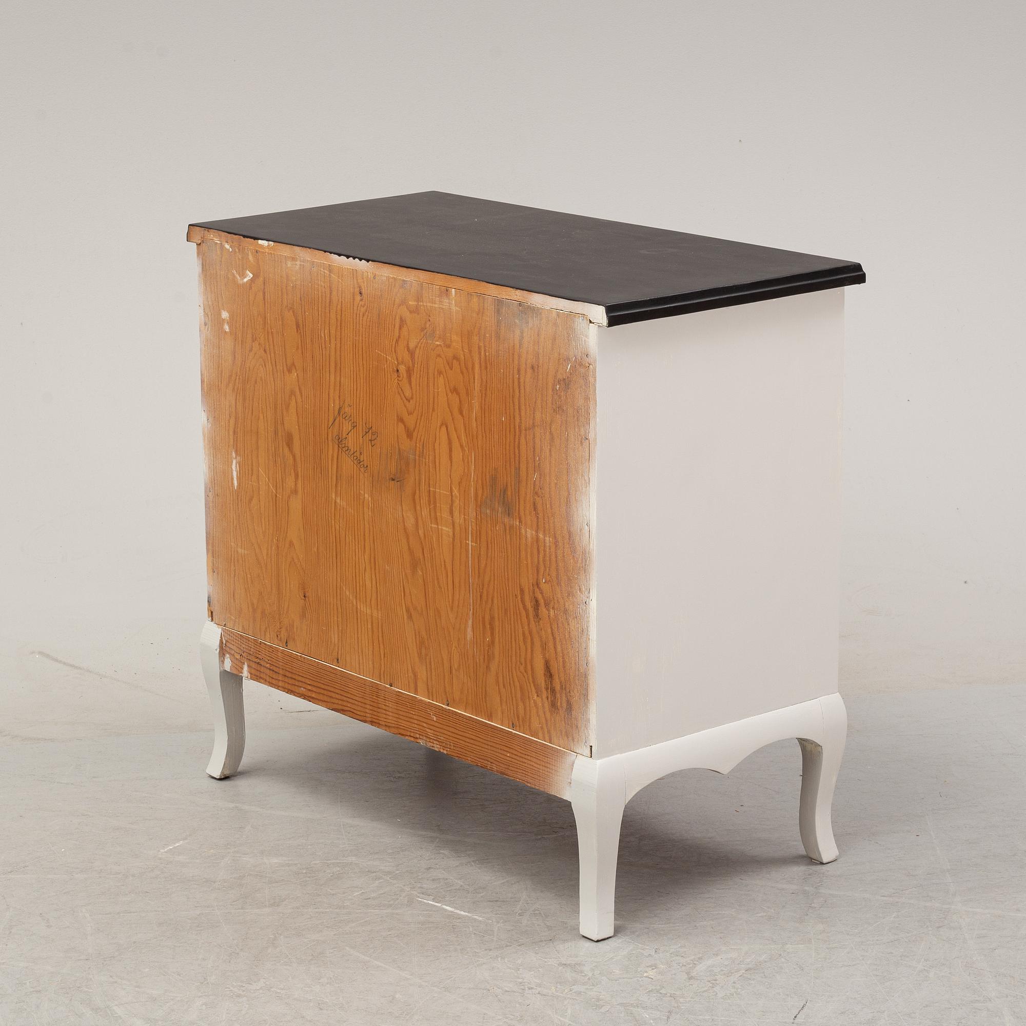 A painted chest of drawers, mid 20th Century.