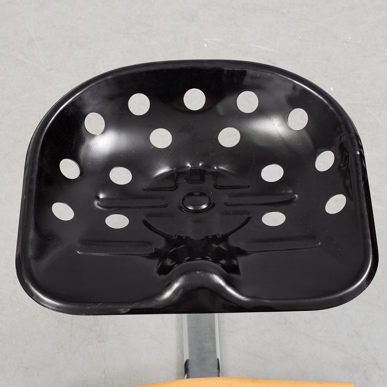 A 'Mezzadro' stool by Achille Castiglione & Pier Giacomo Castiglione for Zanotta, Italy.