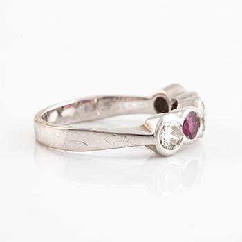 White gold and brilliant cut diamond and ruby ring.