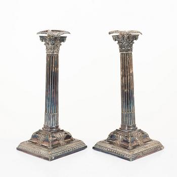 A pair of silver plate candlesticks, no marks, 20th century.