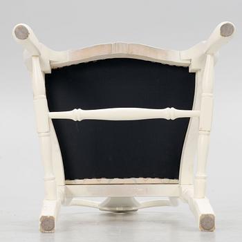 A Rococo style dining table with eight chairs, second half of the 20th century.