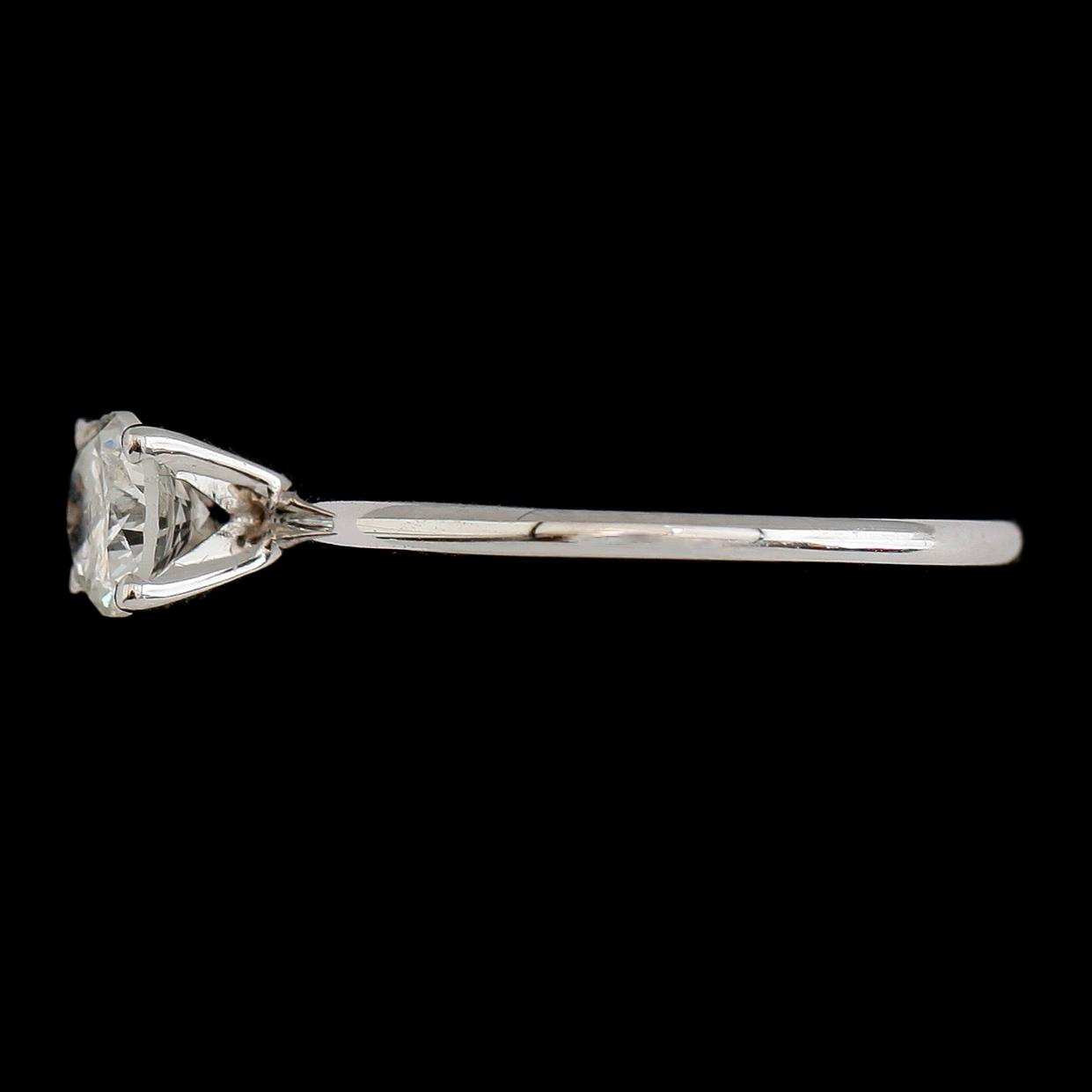 RING, 14 k vitguld, solitär briljantslipade diamant ca 0.50 ct.