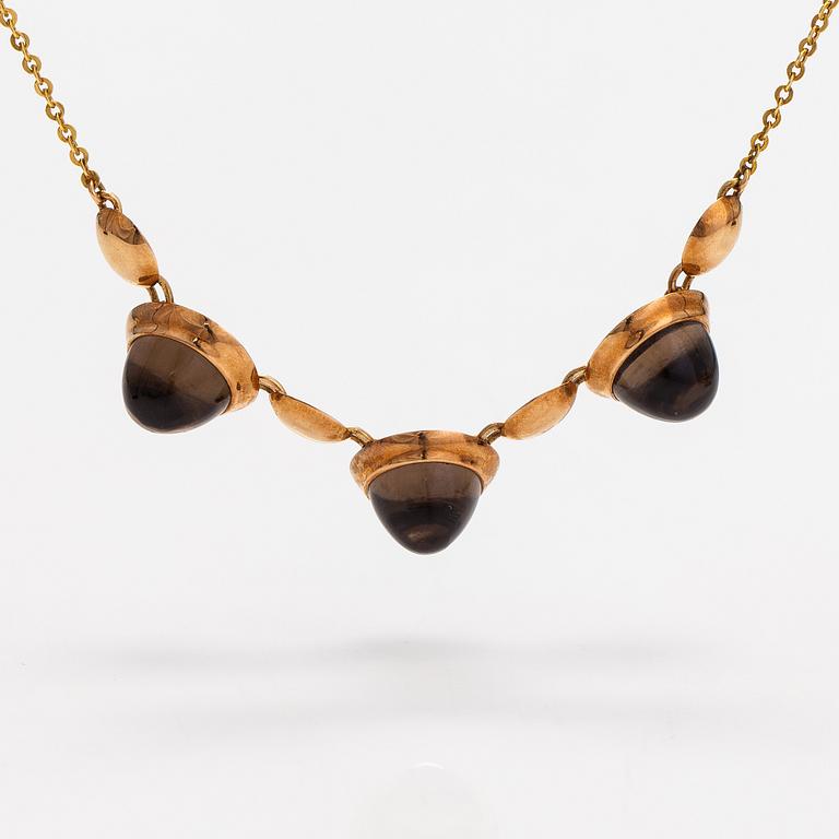 Elis Kauppi, A 14K gold necklace with smoky quartzes. Kupittaan kulta, Turku 1960.