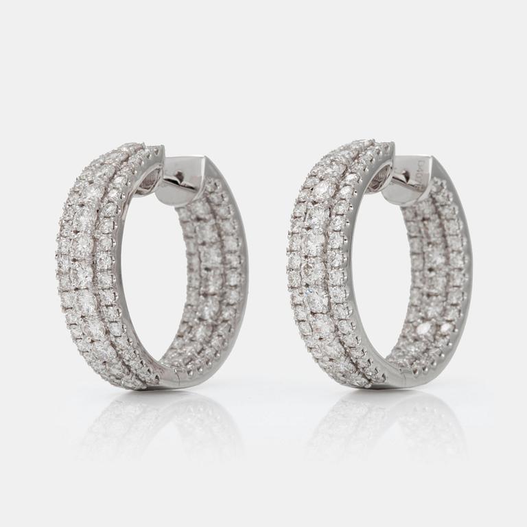 A pair of diamond earrings, 4.08 cts in total, according to engraving.