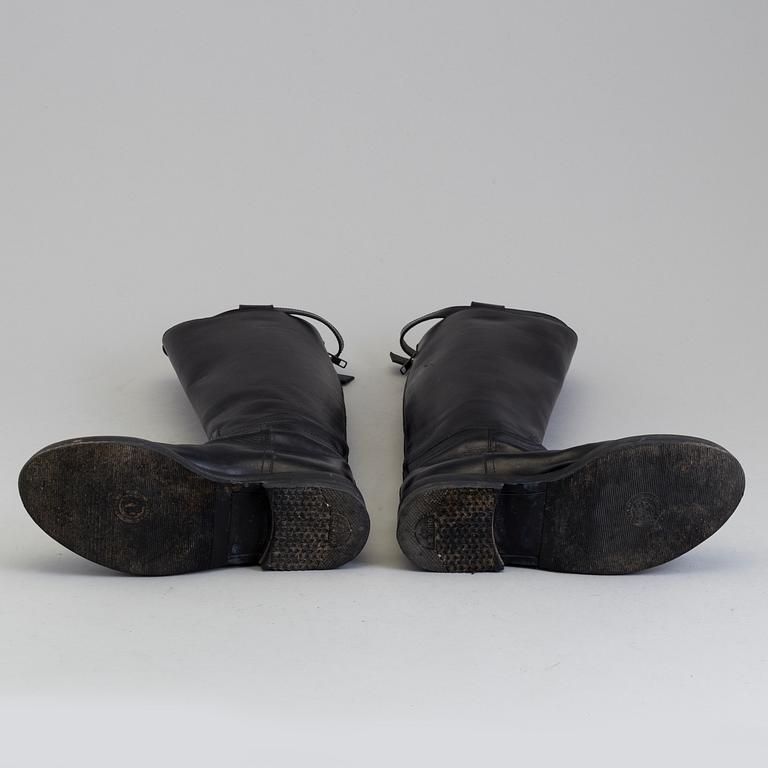 a pair of Ann Demeulemeester, "Vitello Lucido Nero Riding Boots". Size 38.
