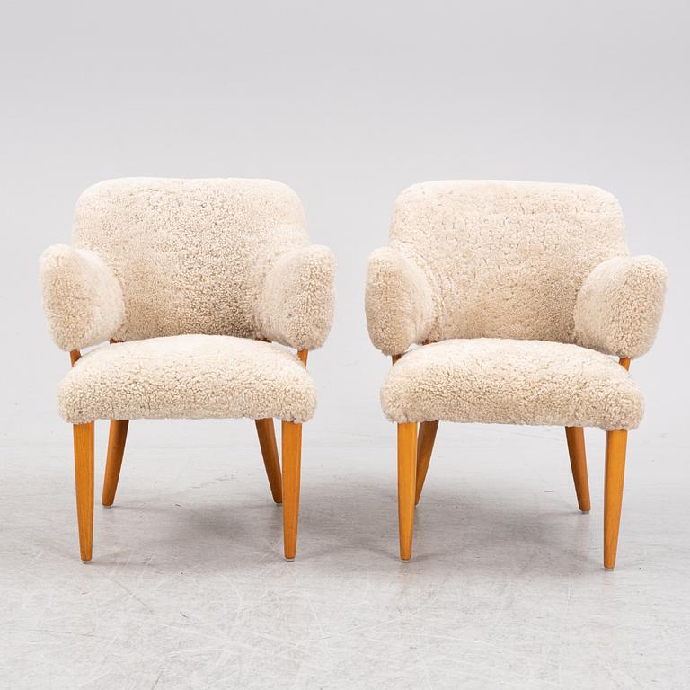 A pair of 'Lilla Sällskapet' armchairs by Carl Malmsten, second half of the 20th Century.