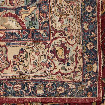 A CARPET, A semi-antique Esfahan part silk, ca 350,5 x 233,5 cm.