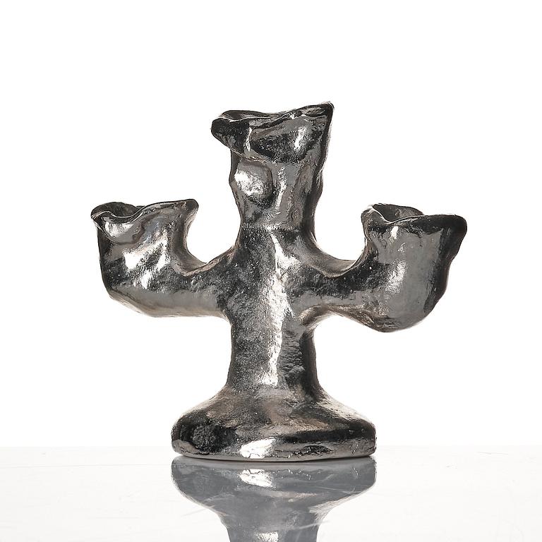 Dan Wolgers, "Källa (Trearmad ljusstake)".