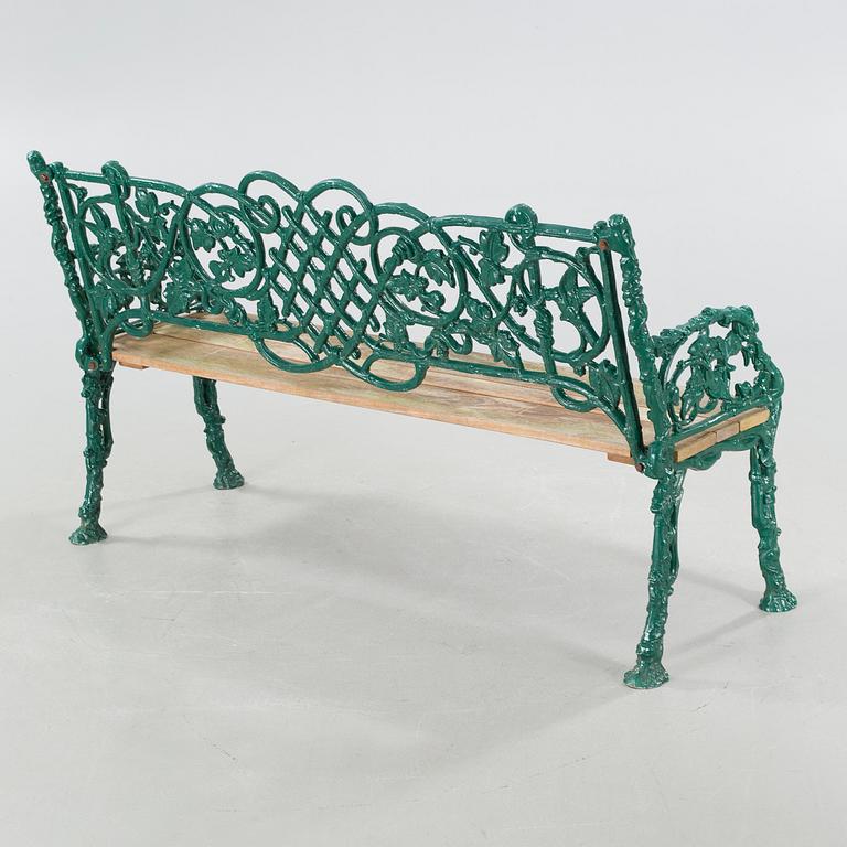 An early 20th century garden sofa.