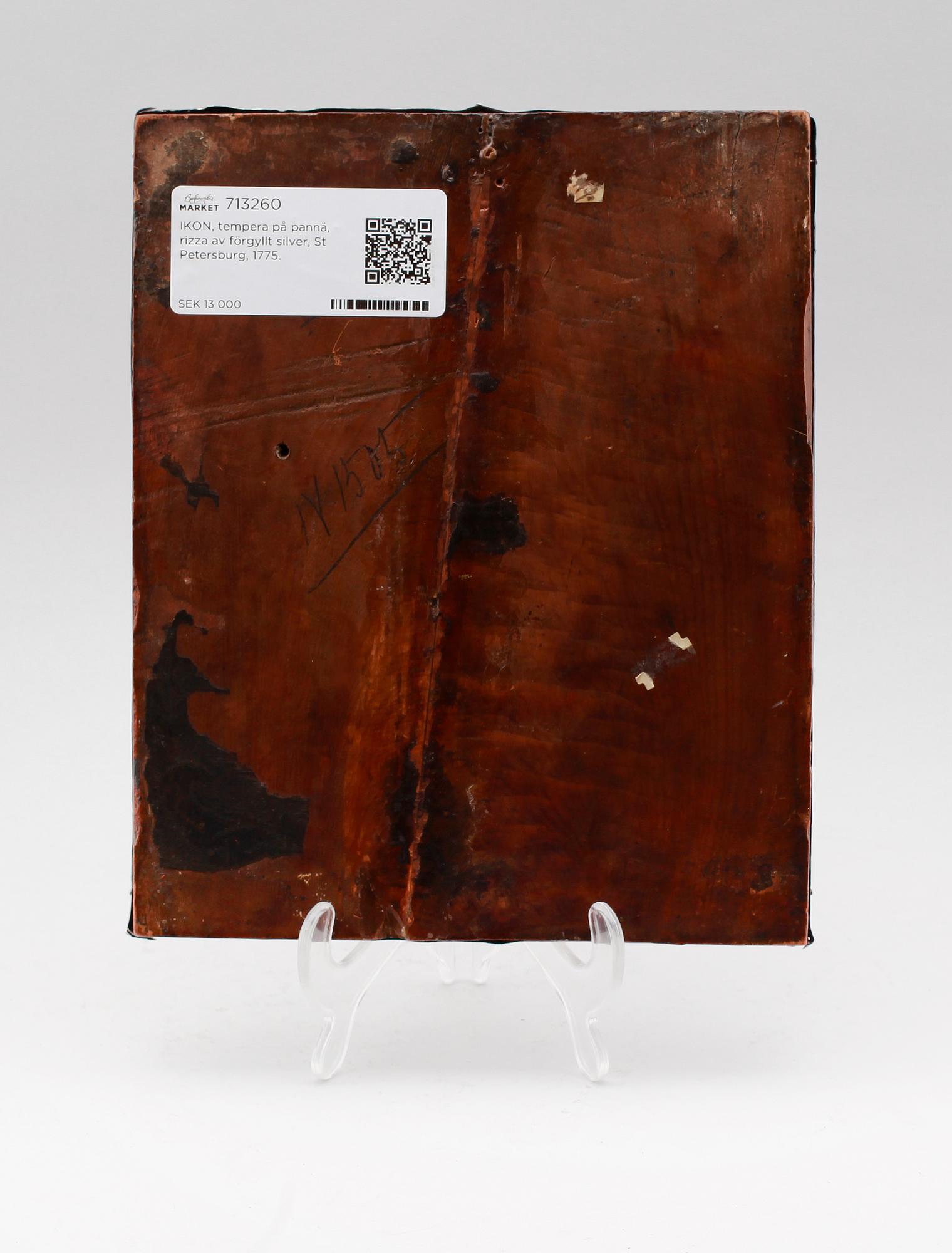 IKON, tempera på pannå, basma av förgyllt silver, St Petersburg, 1775.
