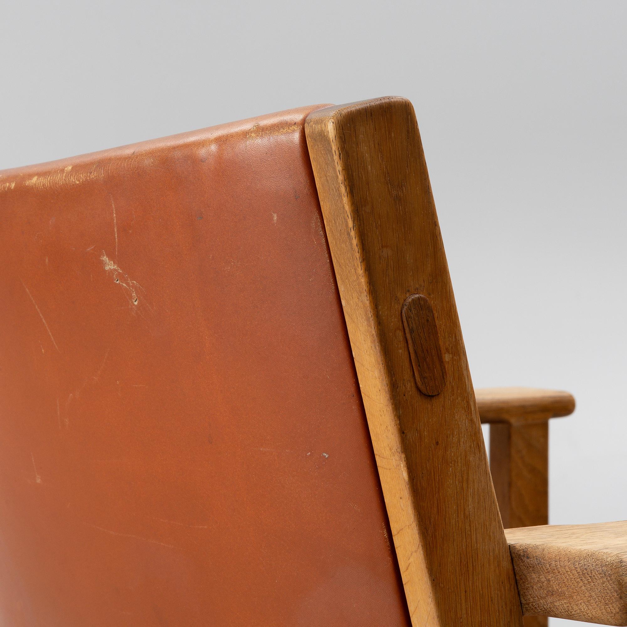 Hans J. Wegner, an armchair for A.P. Stolen, Copenhagen, Denmark, mid 20th century.
