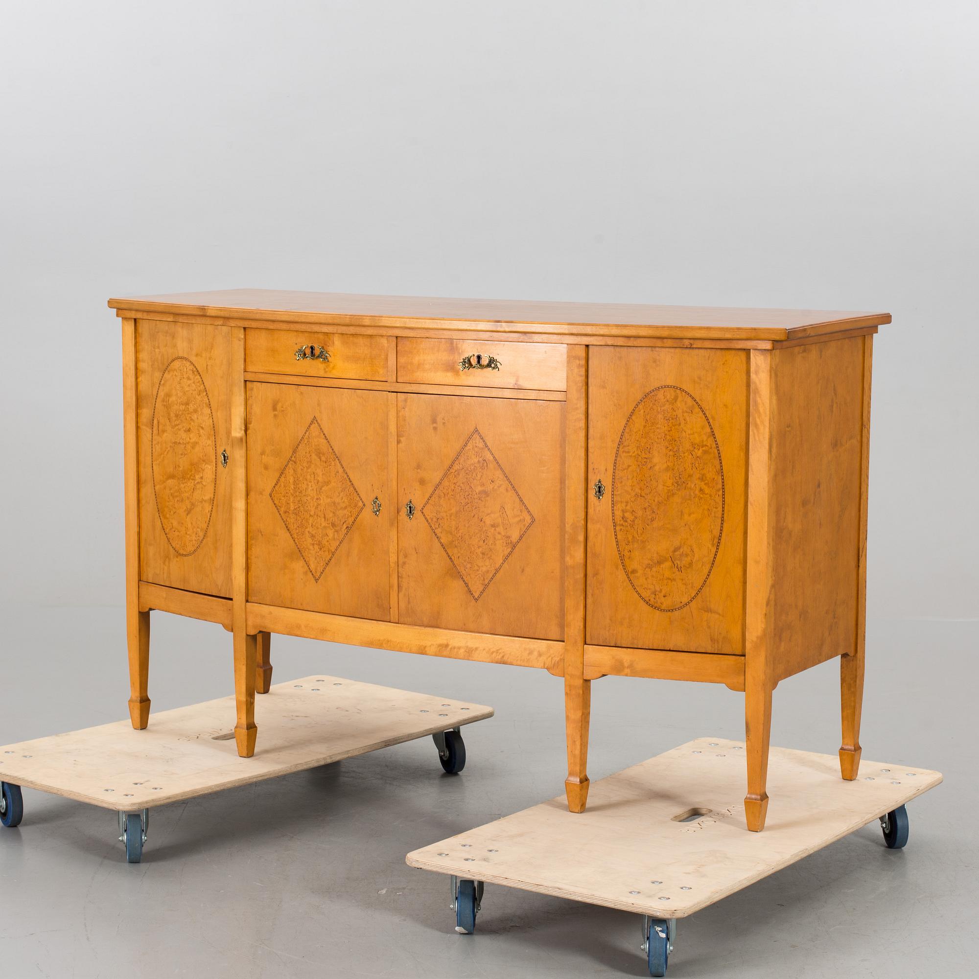 A REGENCY STYLE SIDEBOARD, first half of 20th century.