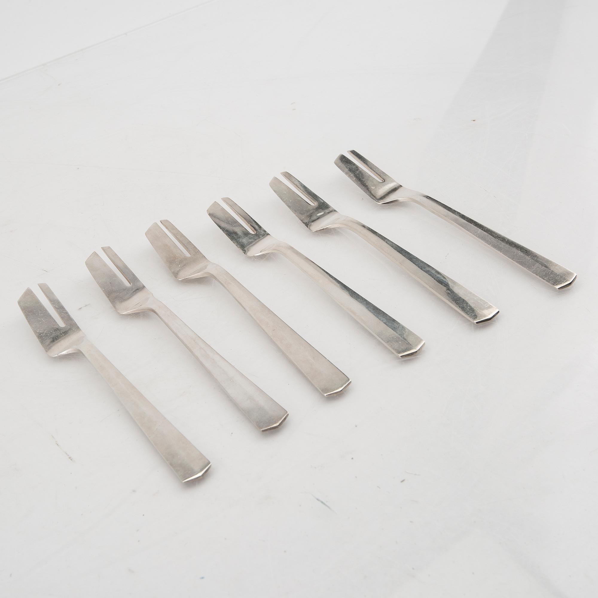 A Swedish 20th century set of 12 silver cake forks mark of Anders Ericson Kristianstad 1969 weight 390 grams.
