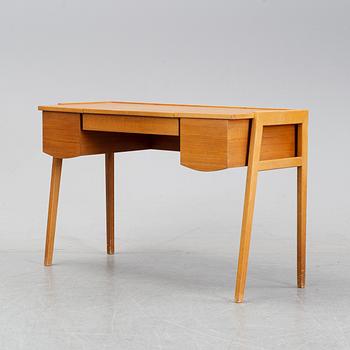 A 1960's teak dressing table.