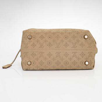 Louis Vuitton, a 'Mahina Galatea MM' bag.