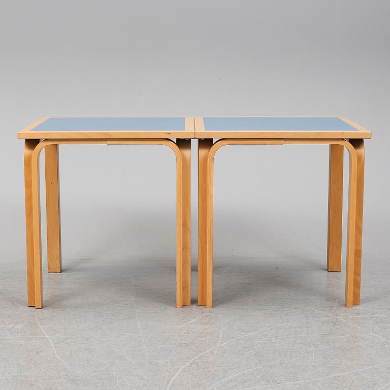 Table with four chairs, late 20th Century by Magnus Olesen.