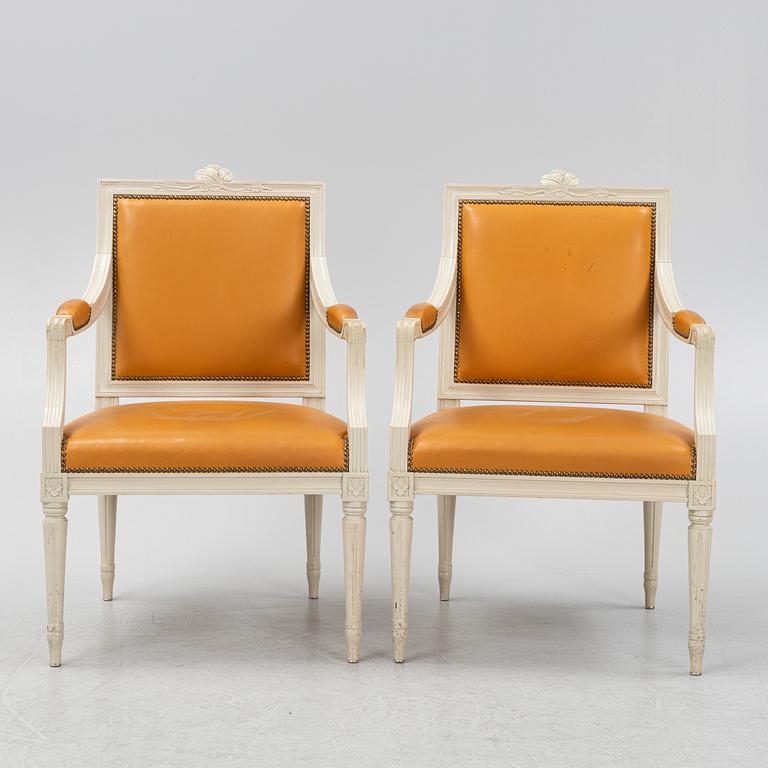 A pair of Gustavian style armchairs, end of the 20th Century.