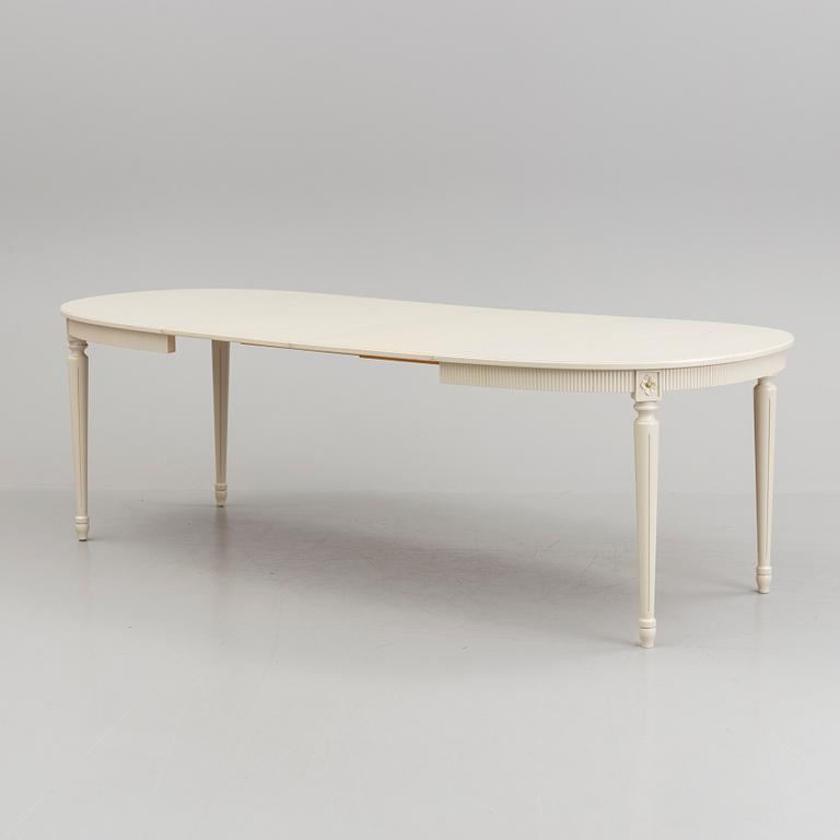 A 20th century Swedish Gustavian style dining table.