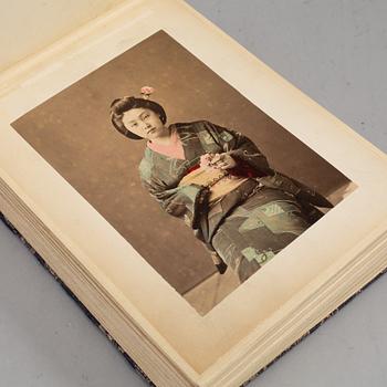 Two signed photographs of the Japanese crown prince and his wife and a photo album.