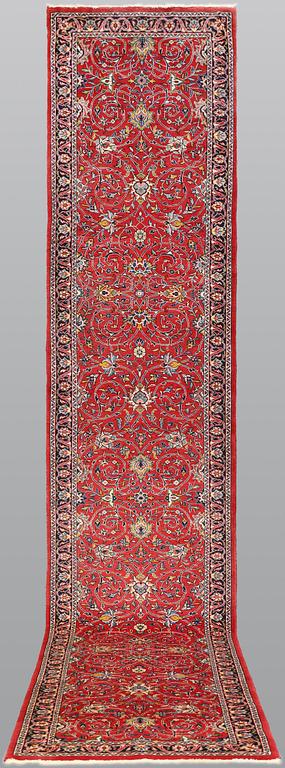 A Sarouk runner, c. 425 x 79 cm.