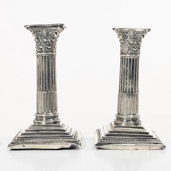 A pair of English silver column candlesticks, mark of Walter Latham & Son, Sheffield, 1910.