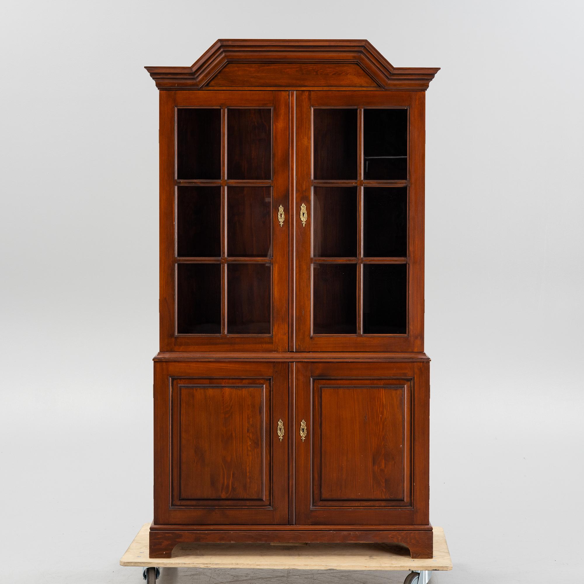 A vitrine cabinet from Åmells, dated 1975.
