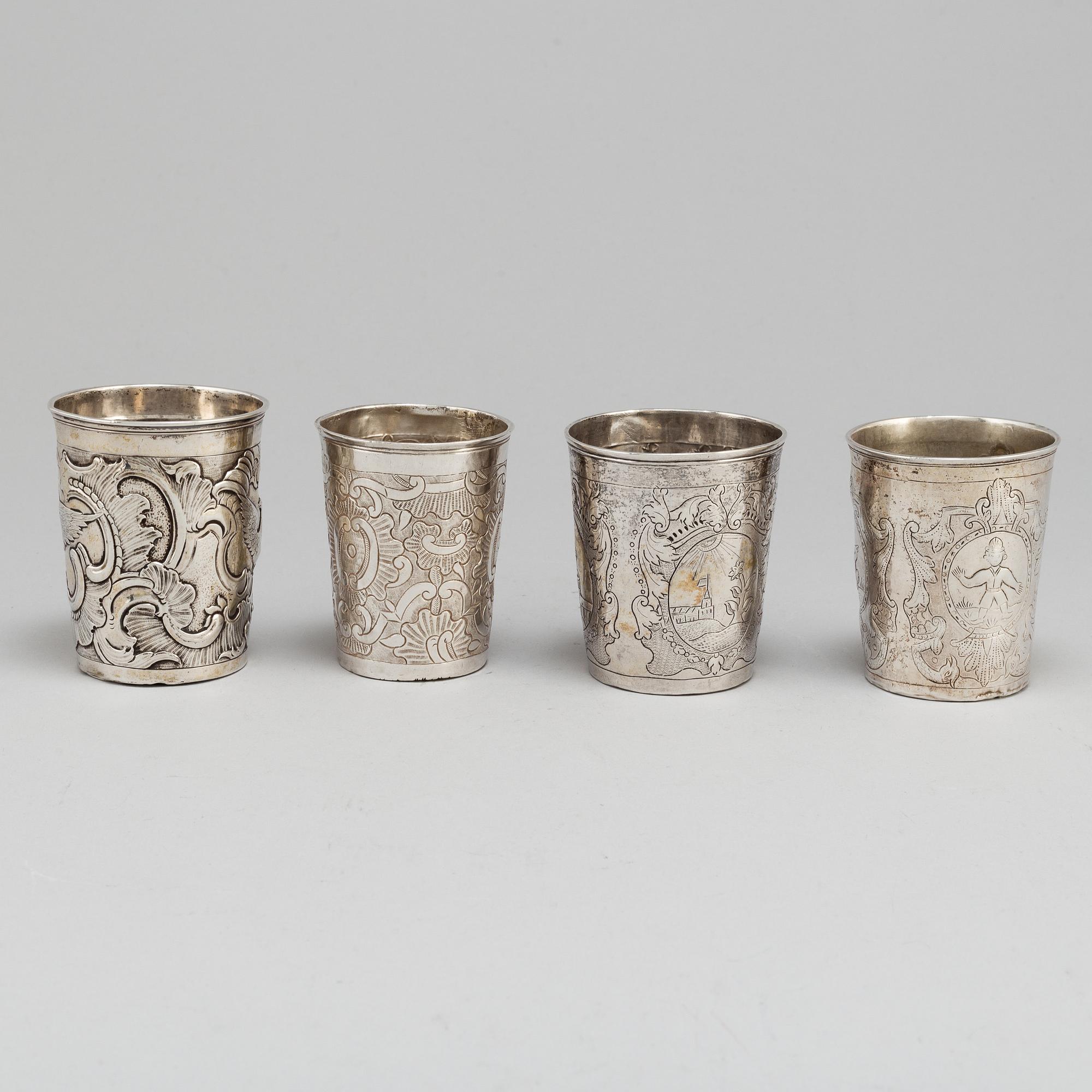 Four Russian 18th century silver beakers.
