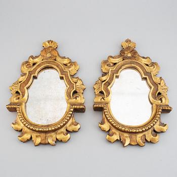 A pair of Louis XV mirrors from the 18th century.