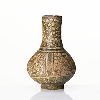 A central or northern persian pottery jug, probably 13th to 14th century.