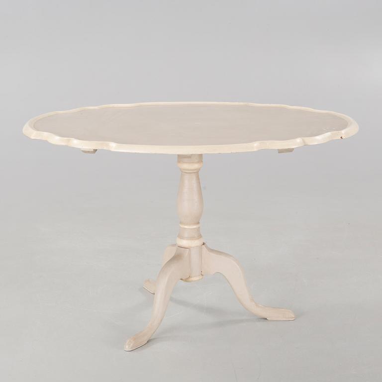 A late 19th century drop-leaf table.
