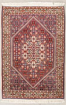An old Bidjar carpet approx 100x71 cm.