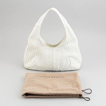 Bottega Veneta, a white intrecciato leather hobo bag.