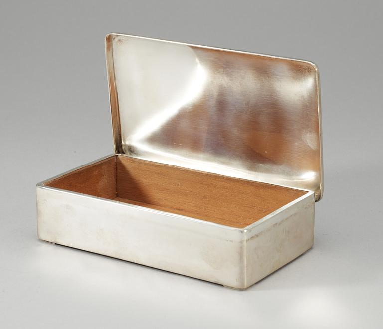 A silver cigarett box, marks by CG Hallberg, Stockholm 1944.