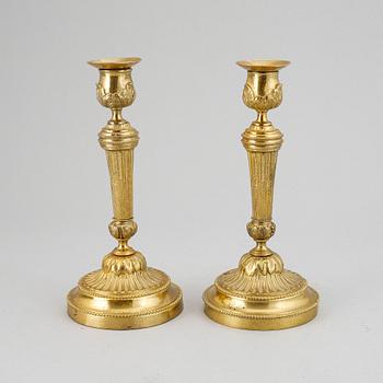 A pair of Louis XVI-style candlesticks, ca 1900.