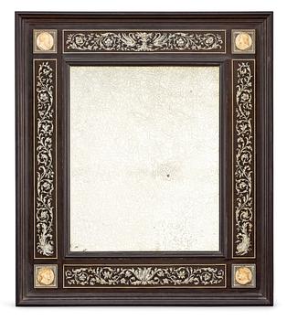 A Renaissance-style 19th century table mirror.