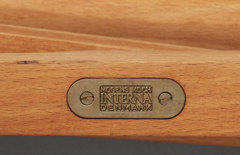 A set of six folding chairs with stand by Mogens Koch, Interna, Denmark.