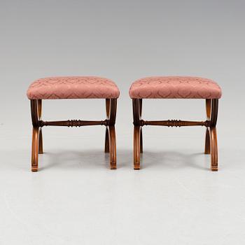 A pair of walnut stools by A. Svensson & Sons Göteborg c. 1900.