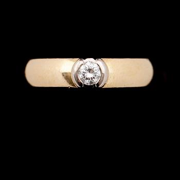 RING, 18 k guld och vitguld, briljantslipad diamant 0.25 ct, HE Stockholm 2000. Vikt 8 g.