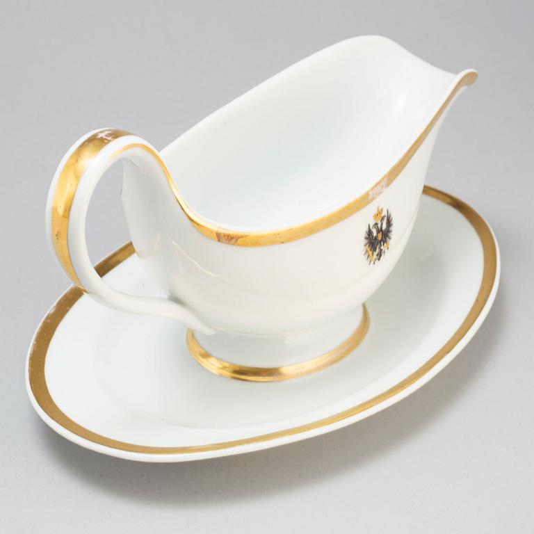 A first half of the 19th century porcelain plate and sauce boat, KPM, Berlin, Germany.